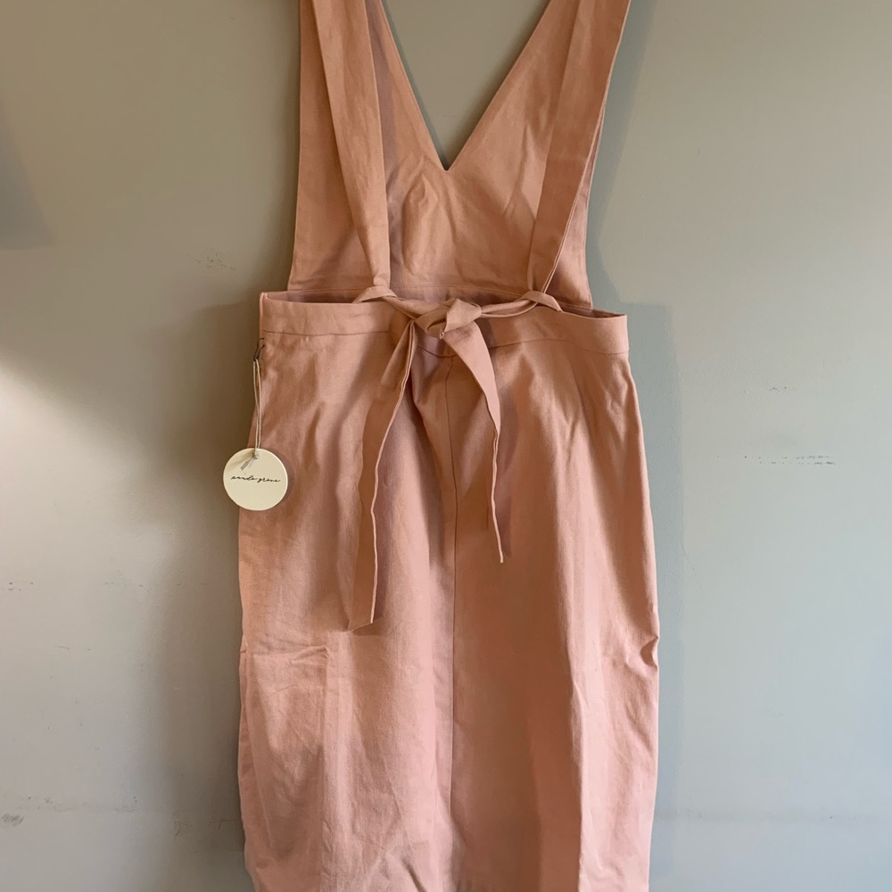 Unique apron style dress.